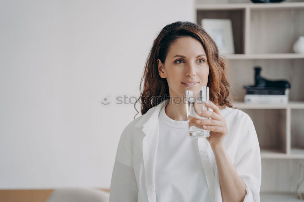 Similar – Image, Stock Photo Smiling young woman sitting at table in cafe