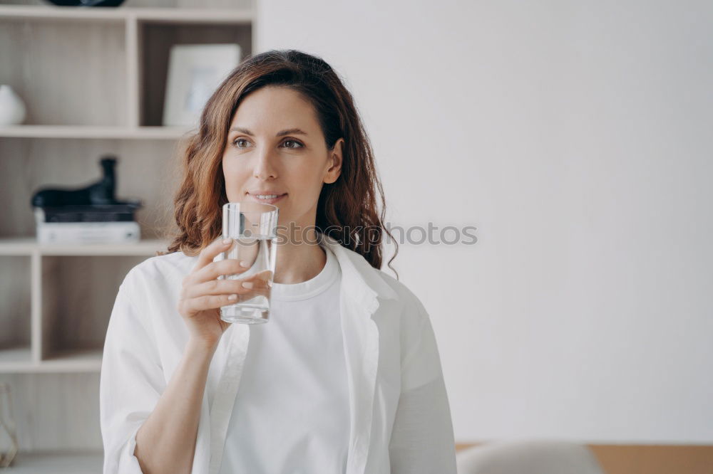 Image, Stock Photo Smiling young woman sitting at table in cafe
