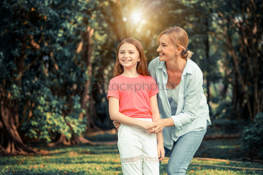 Similar – Image, Stock Photo Mother with child in park