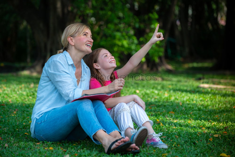 Similar – happy mother and daughter making selfie outdoor