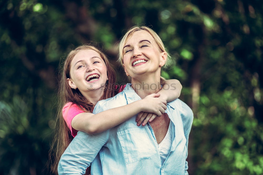 Similar – Image, Stock Photo Girls hugging at lake