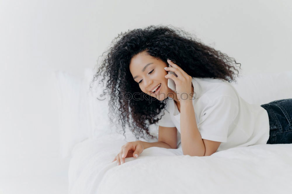 Similar – Image, Stock Photo Happy beautiful young black woman relaxed sitting in the bed