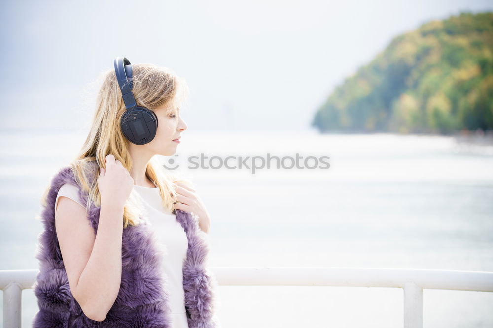 Similar – Young dreamy woman at seaside