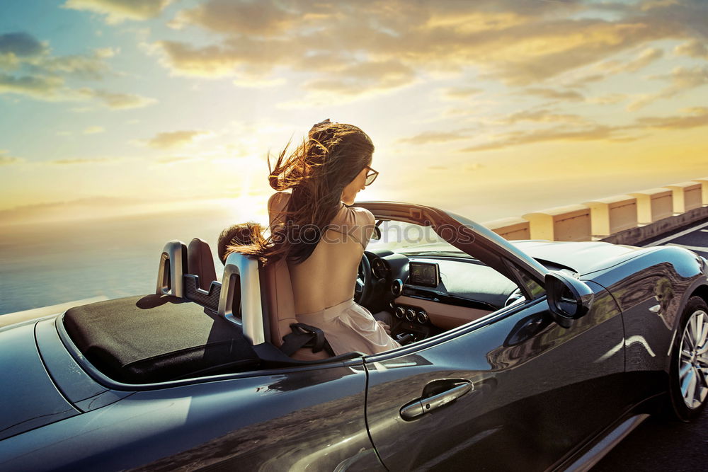 Similar – View of the street from the back seat of a vintage car