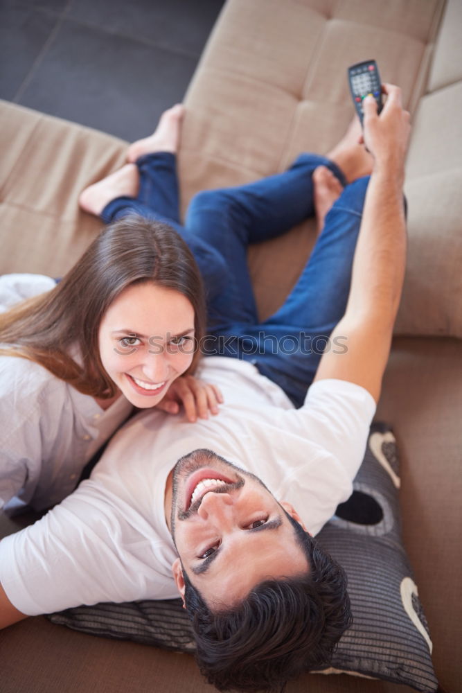 Similar – Image, Stock Photo Young women using mobile phones watching music clip, texting, messaging. Teenagers using the smartphones, sitting on sofa at home. Using technology devices. Girls wearing summer clothing