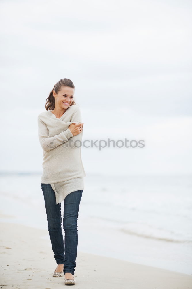Similar – Image, Stock Photo Woman walking away on the idylic beach.