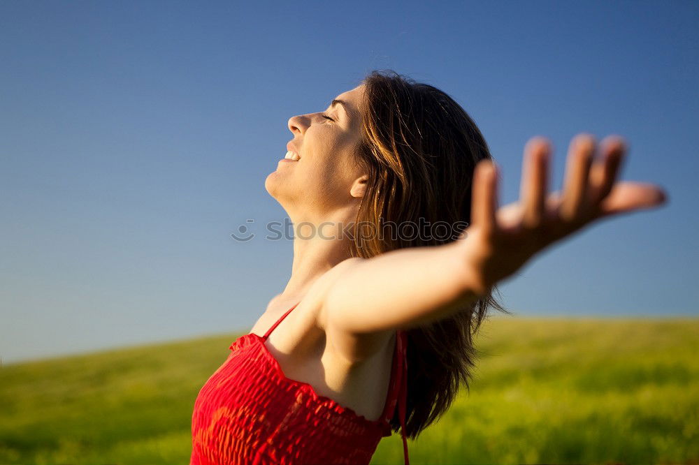 Young woman jumping in nature