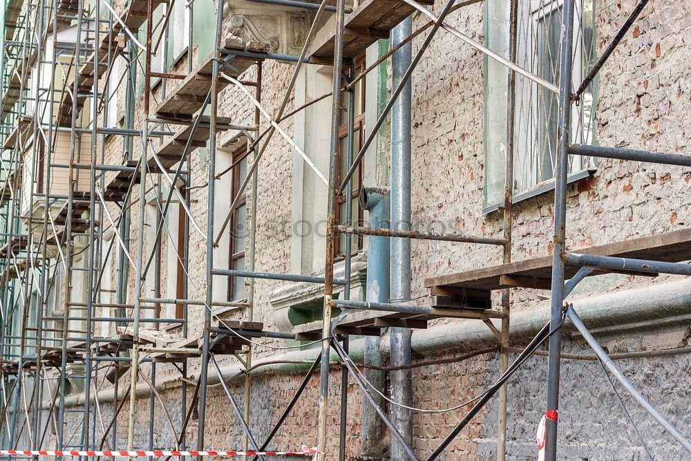 Similar – Foto Bild Bauzaun aus Holz vor dem Neubau eines Wohnhaus mit Baugerüst am ehemaligen Hafen in Offenbach am Main in Hessen