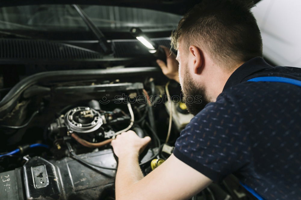 Similar – Person doing maintenance of bike