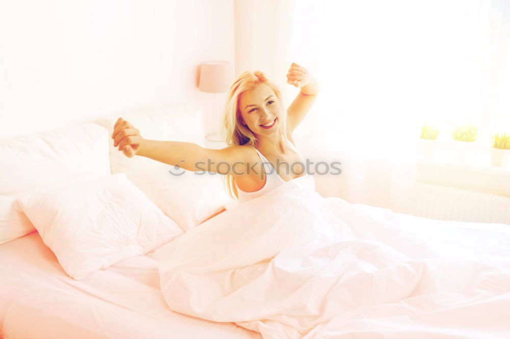 Image, Stock Photo Pretty blonde woman folded head on levitating pillow