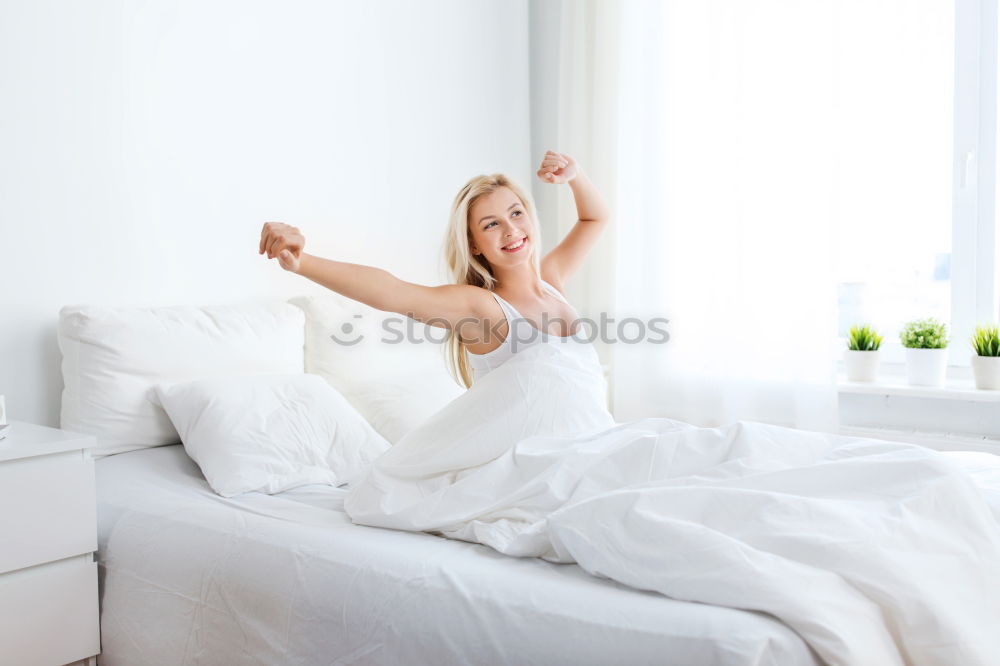 Similar – happy sleepy kid girl stretching in her room