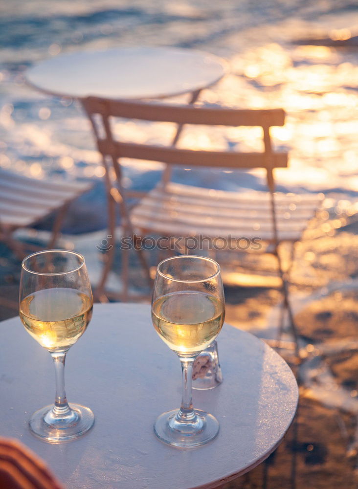 Similar – Image, Stock Photo Two wine glasses, wicker basket on beach