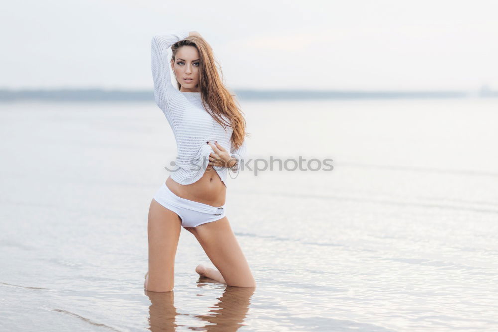 Similar – Image, Stock Photo Young woman doing yoga in the beach