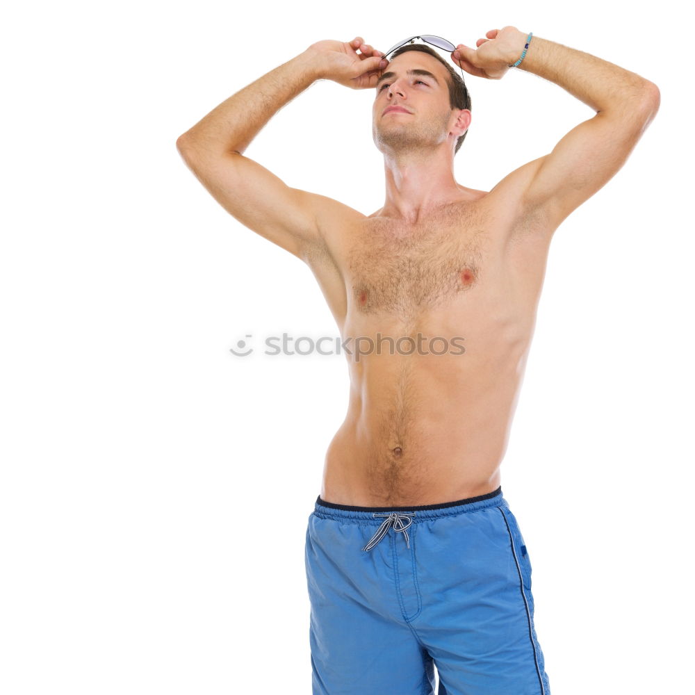 Similar – handsome swimmer putting on goggles