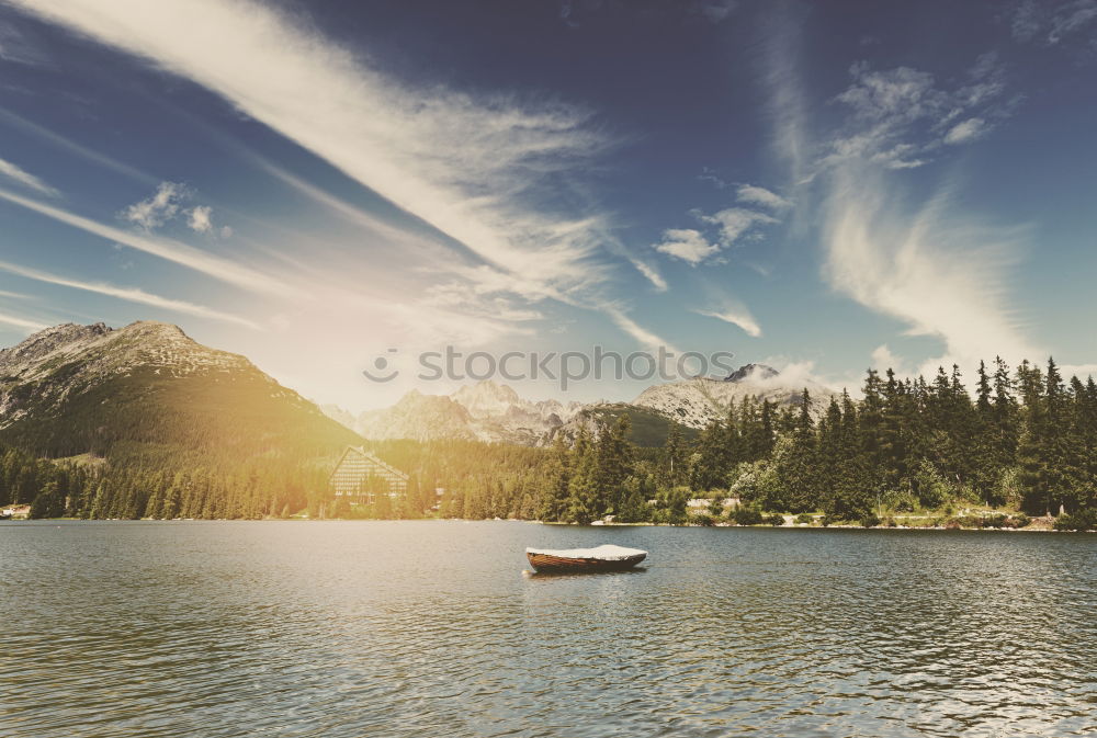 Similar – Pier on mountain lake Lake