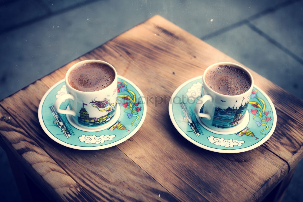 Similar – Espresso set with coffee cups, beans and coffee pot