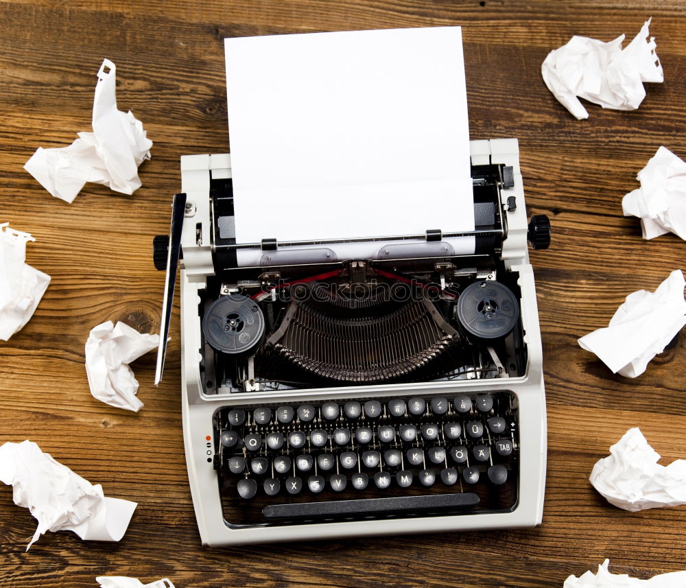 Similar – Text prescribed on a vintage typewriter and watch timekeeper.