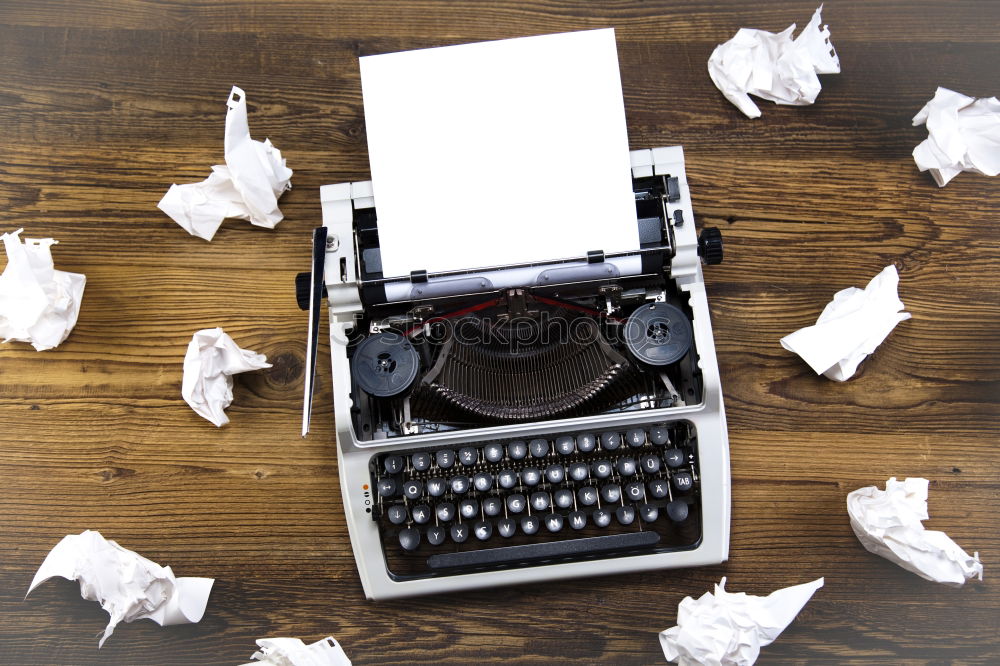 Similar – Text prescribed on a vintage typewriter and watch timekeeper.