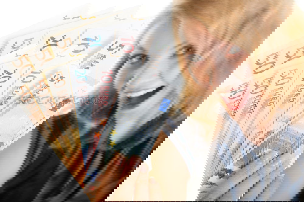 Similar – Image, Stock Photo Payday | hands of a young woman and many banknotes standing on the table before her.