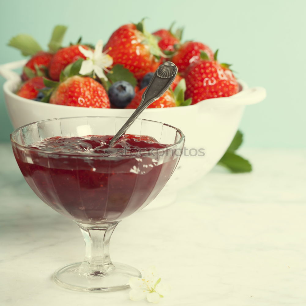 Similar – Red fruit jelly with mint