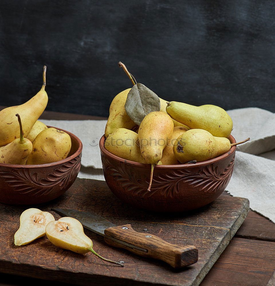 Image, Stock Photo ripe yellow pears in a brown clay bowl