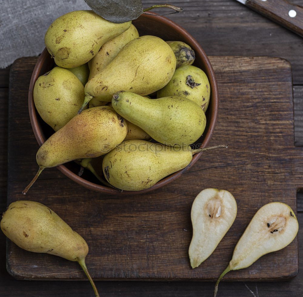 Image, Stock Photo fresh ripe yellow pears on a brown wooden table