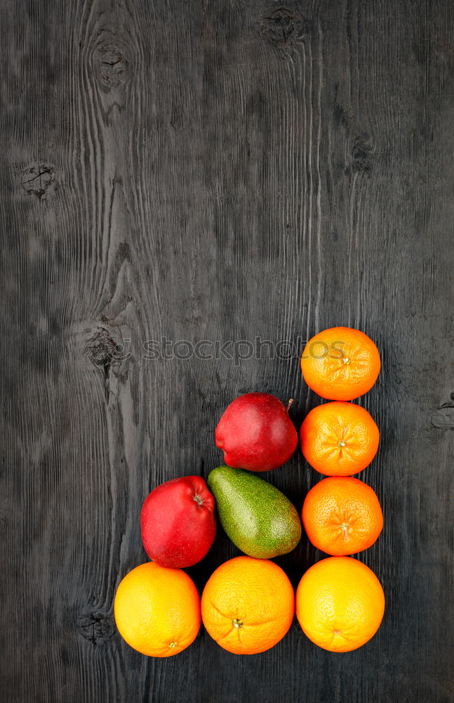 Similar – Border of mandarins with leaves