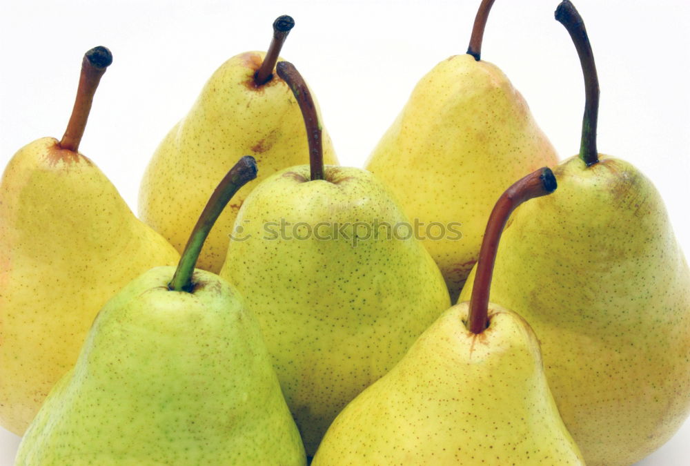 Similar – Image, Stock Photo Eight pears and three tomatoes, regularly arranged on a wooden table