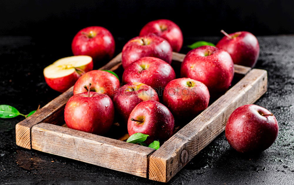 Similar – ripe red peaches in a wooden bowl on a table