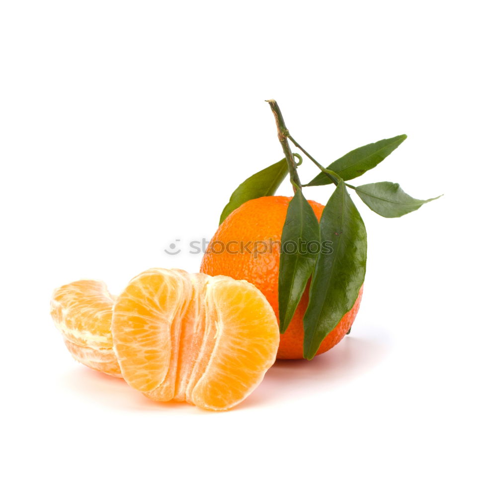 Similar – Orange fruit with green leaves on white wood