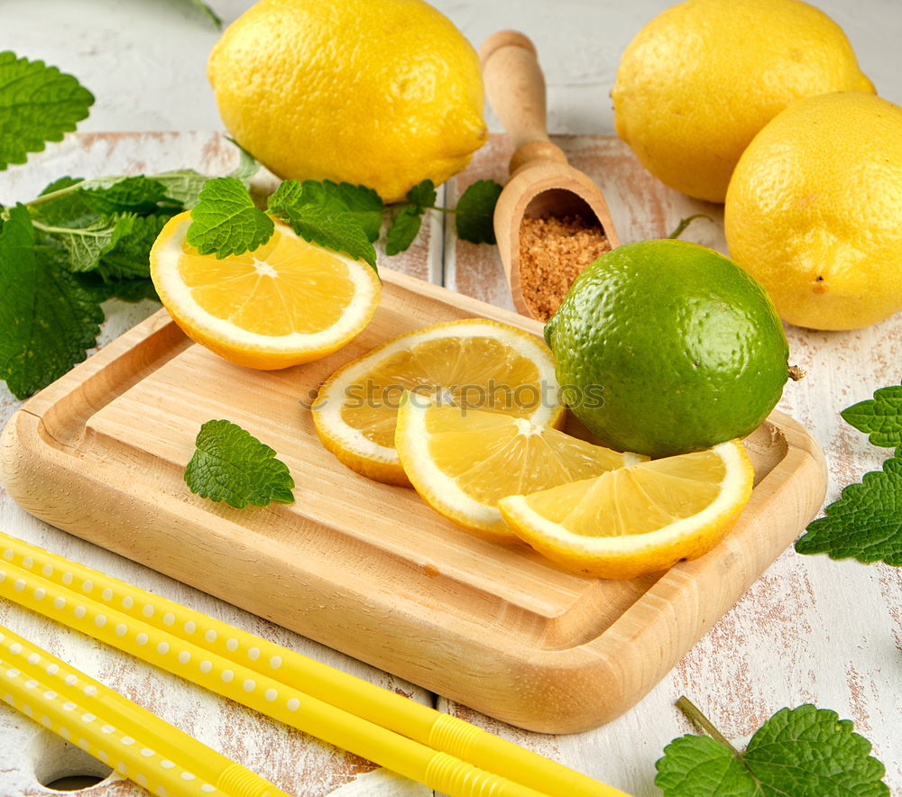 Image, Stock Photo ripe yellow lemons and lime, mint green