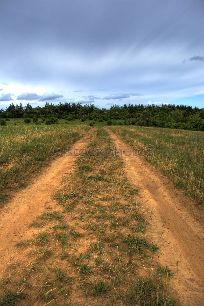 Similar – Strange field stones Hill