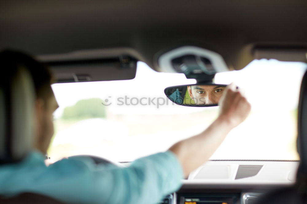 Similar – Taxi driver in a mask with a client on the back seat wearing mask