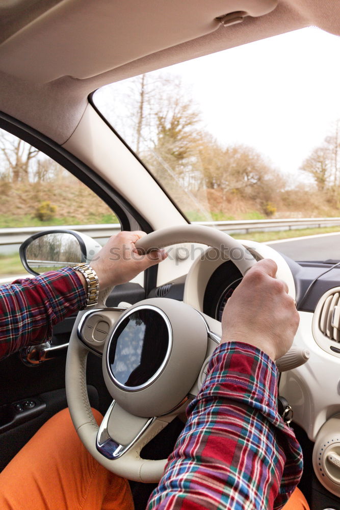 Similar – Image, Stock Photo Young man driving a car