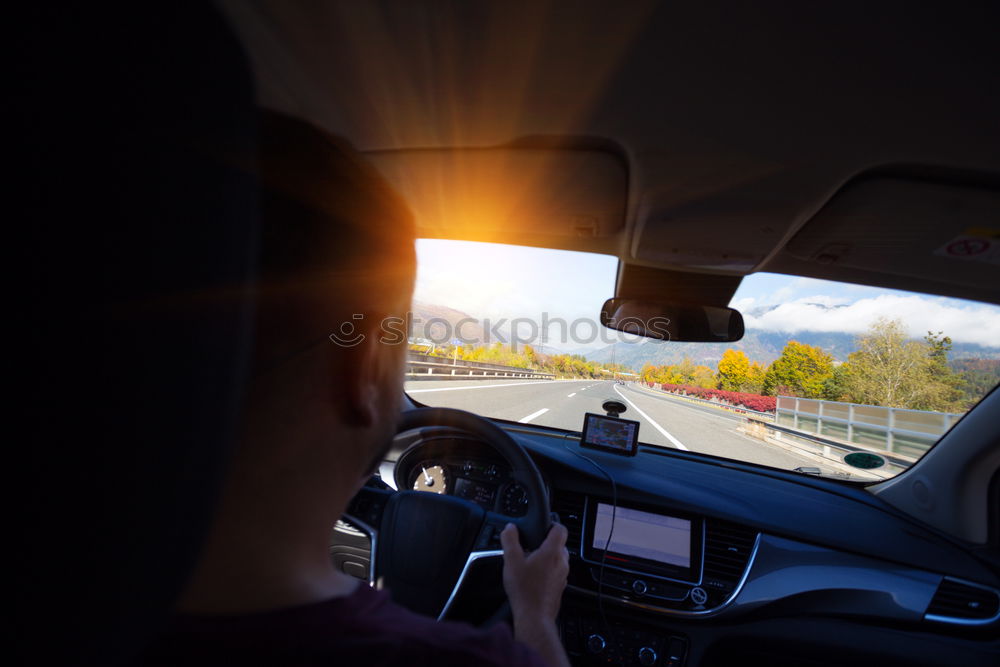 Similar – Image, Stock Photo Young woman in the frontseat of a car