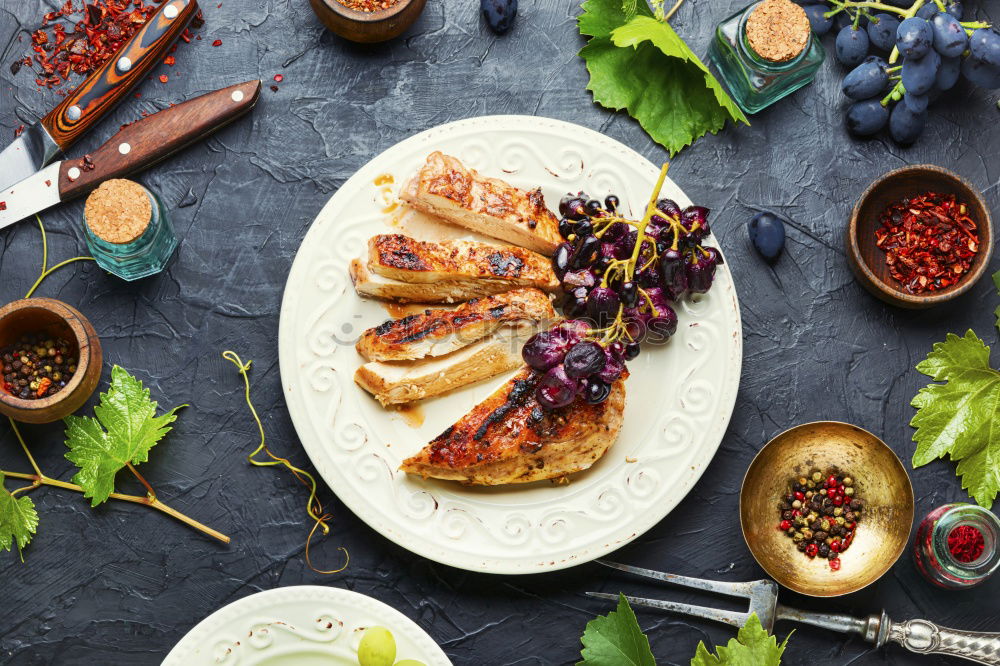 Similar – Image, Stock Photo Grilled sardines on baking tray with ingredients: lemon, garlic and herbs for tasty seafood eating. Cooking preparation of fishes