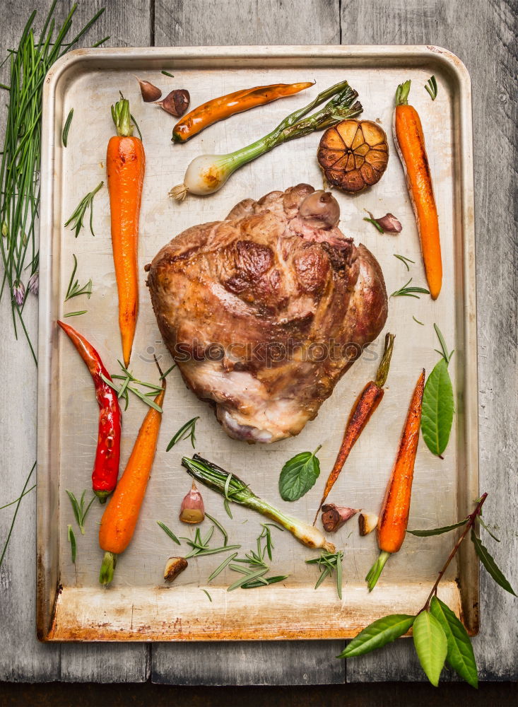 Similar – Leg of lamb roast with roasted vegetables