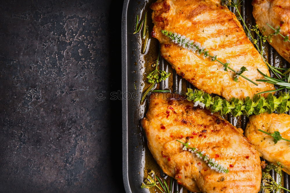 Image, Stock Photo Fried chicken breast in grill pan with fresh herbs