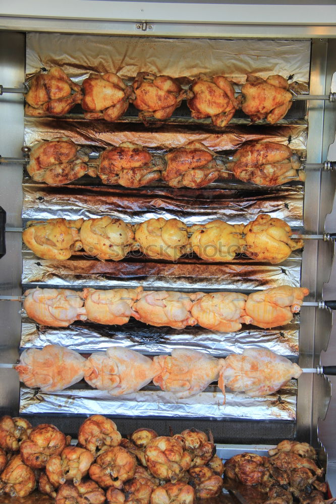 Similar – Baker carrying rack with fresh pastry