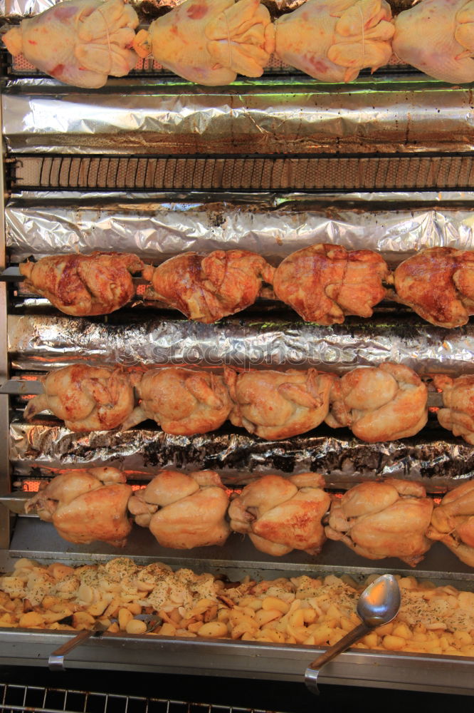 Similar – Baker carrying rack with fresh pastry