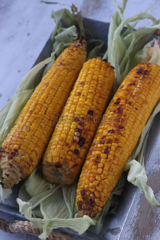 Similar – Roasted corn salted.