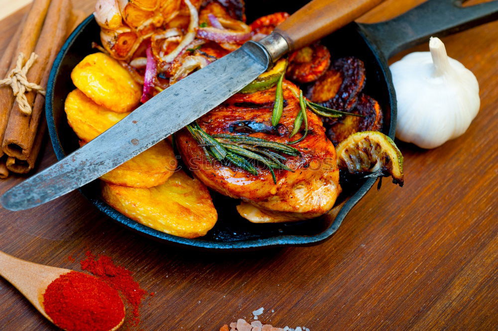 Similar – Image, Stock Photo Roasted pork fillet with crust and baked potatoes