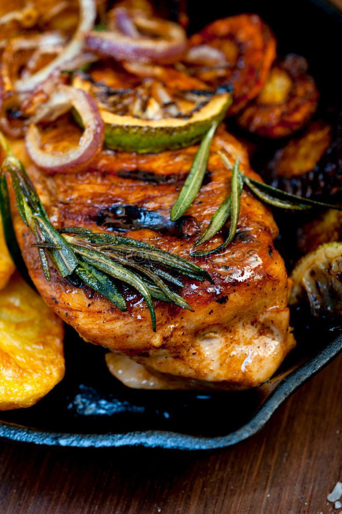 Similar – Image, Stock Photo Fried chicken breast in grill pan with fresh herbs