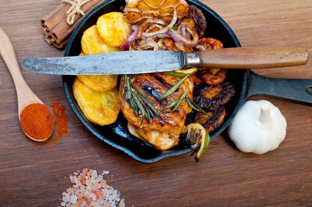 Similar – Image, Stock Photo Roasted vegetable stew and kitchen utensils