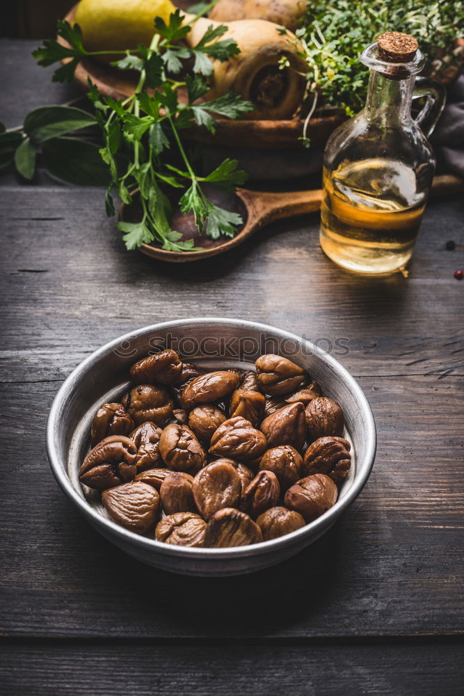 Image, Stock Photo Fried chestnuts in bowl on the kitchen table