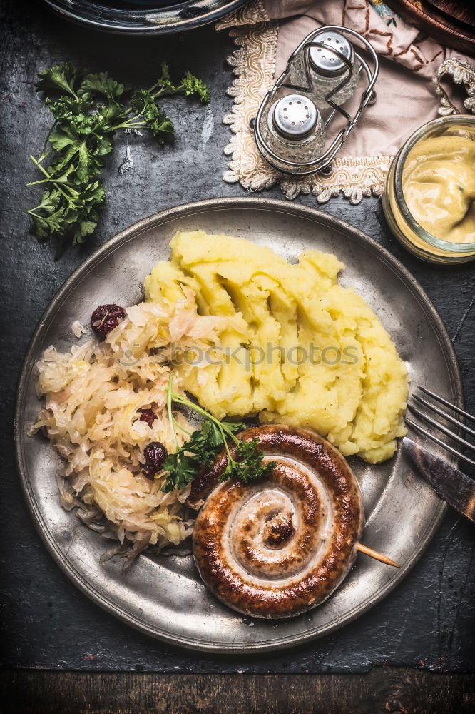 Similar – Image, Stock Photo Fried sausage with potatoes and sauerkraut