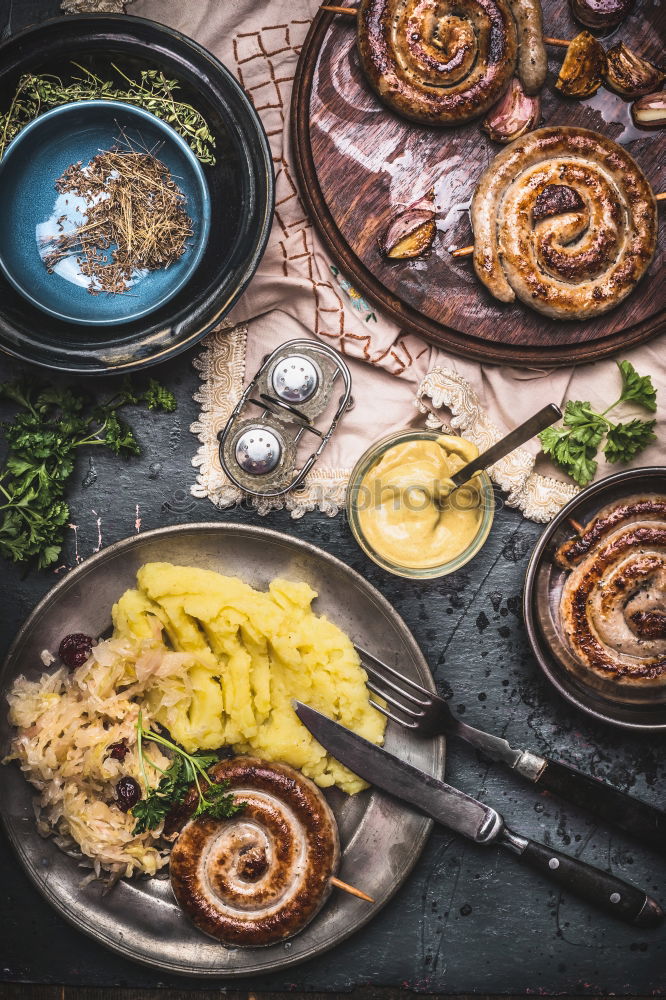 Bratwurst with potatoes and sauerkraut