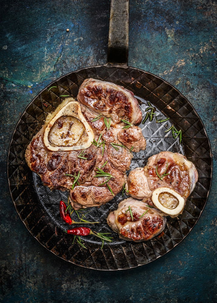 Image, Stock Photo Roasted knuckle of veal slices in the pan