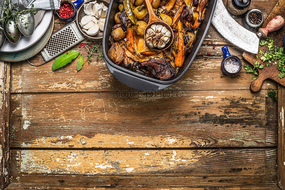 Image, Stock Photo Roasted vegetable stew and kitchen utensils