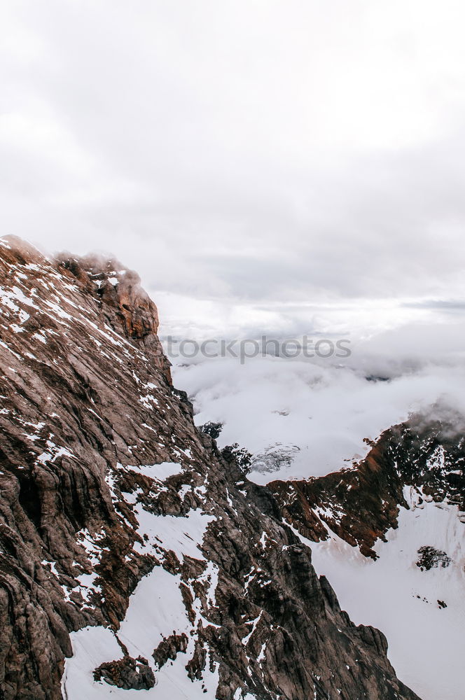 Image, Stock Photo Man in outerwear on snowy mountains